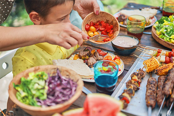 Table full of food for a family.