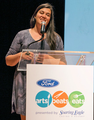 OCC alum, Lillian Bishop, singing "You Gotta Have Art" at the Arts, Beats & Eats press conference.