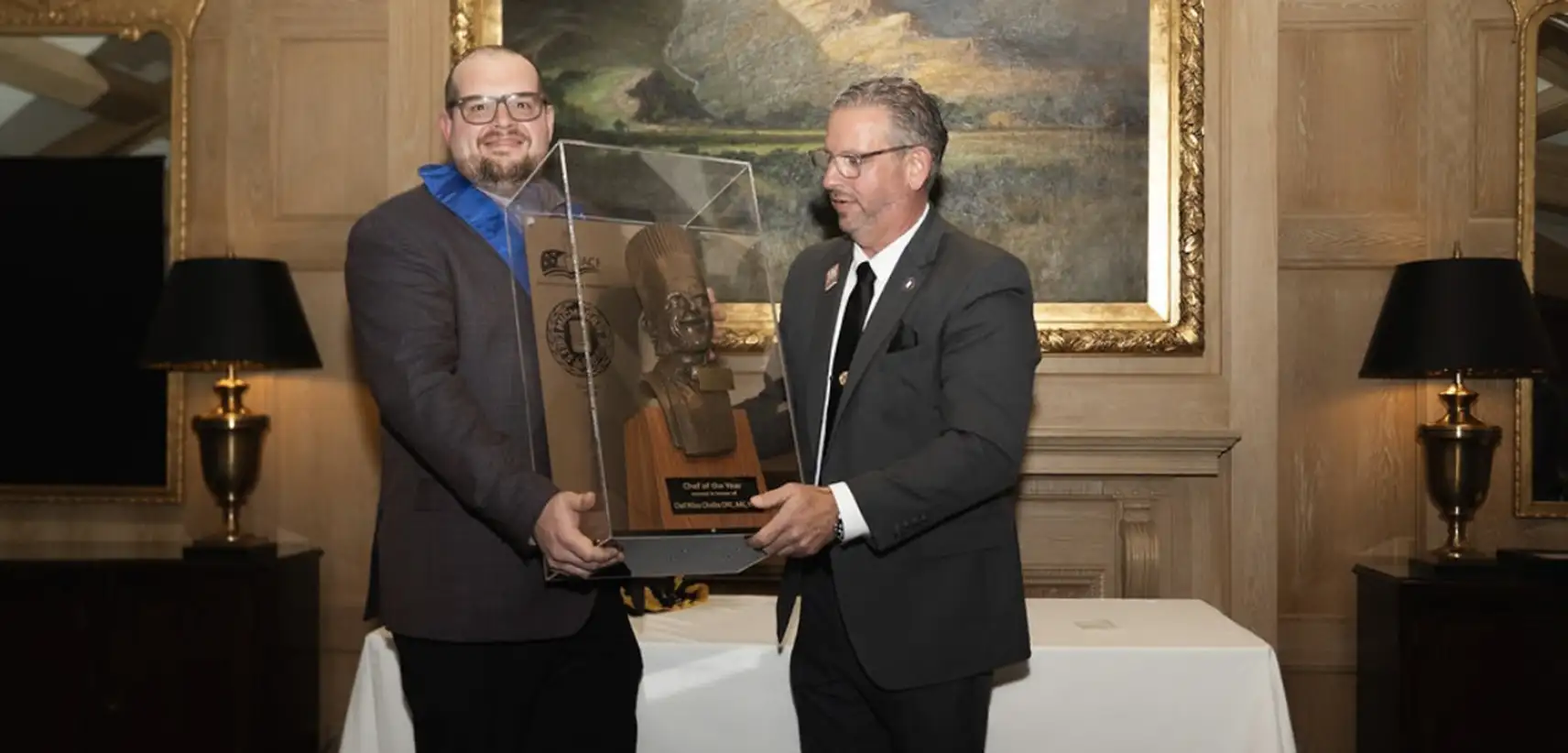 Chef Tyler Colman (OCC adjunct) and Jim Churches President of the Michigan Chefs de Cuisine