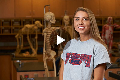 Health science student Abby Passalacqua in a science lab.