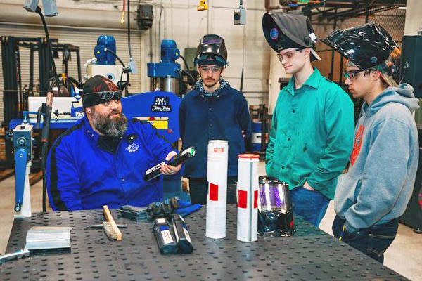 Welding/Fabrication Faculty Cameron Berrier works with students.