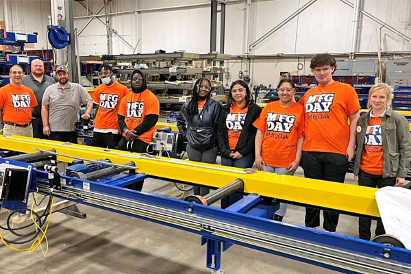 Photo of students at manufacturing plant