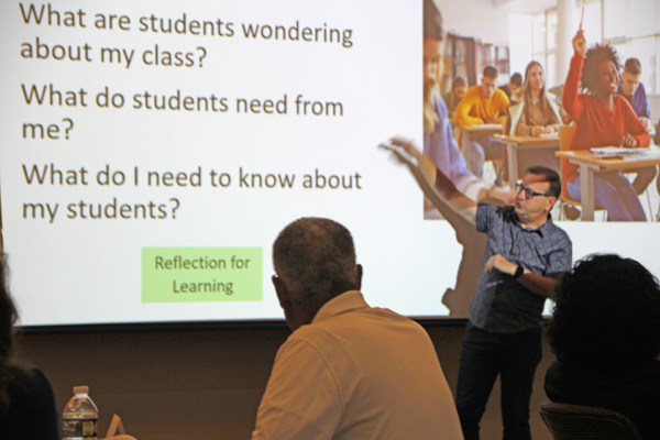 Faculty member Michael Robinson leads a session of the New Faculty Academy