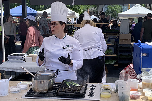 Chef Julie Selonke cooking at Farmington Farmer's Market 