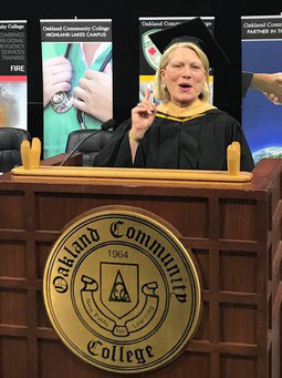 Secretary of State Ruth Johnson speaking at the 2018 OCC Commencement. 