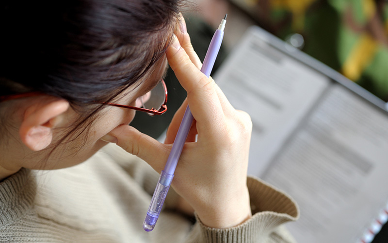 Photo of a student studying.