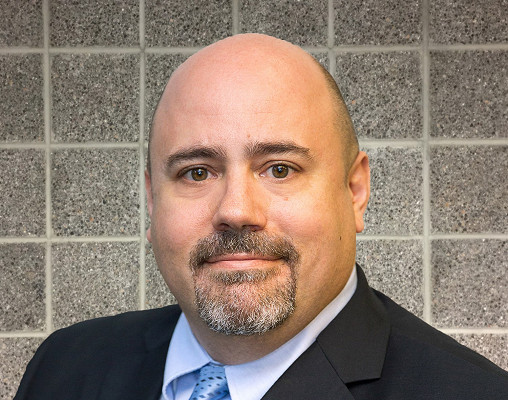 Chris P., OCC graduate and paralegal with Plunkett Cooney Headshot photo of Chris P.